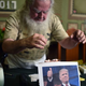 Antonio Vazquez, known as the 'Greatest Sorcerer' puts a spell on Donald Trump, represented by a picture during a ritual in Mexico City on January 5, 2017 (Photo: Yuri Cortez/AFP/Getty Images)